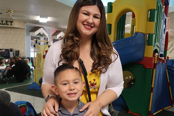 Happy mother and son at a Preschool & Daycare Serving Hesperia, CA