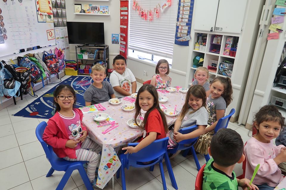 Excited group of preschool kids waiting for meal at a Preschool & Daycare Serving Hesperia, CA