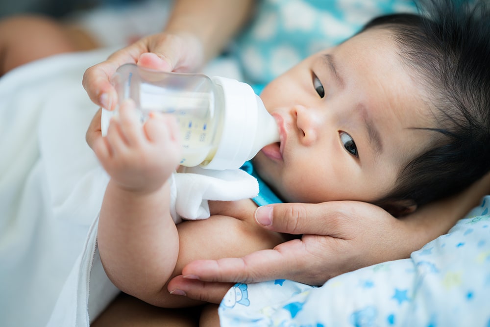 mom feed power milk to her baby at a Preschool & Daycare Serving Hesperia, CA